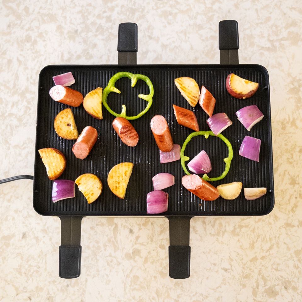 Swissmar Classic Raclette Grill - Black Non-Stick Reversible - 8 Person 3 Swissmar Classic Raclette Grill - Black Non-Stick Reversible - 8 Person - Image 3