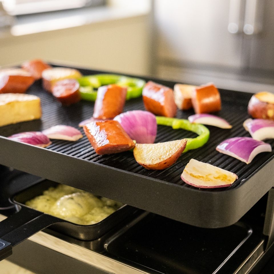 Swissmar Classic Raclette Grill - Black Non-Stick Reversible - 8 Person 4 Swissmar Classic Raclette Grill - Black Non-Stick Reversible - 8 Person - Image 4
